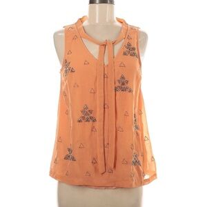 Orange top with beads from Anthropologie
